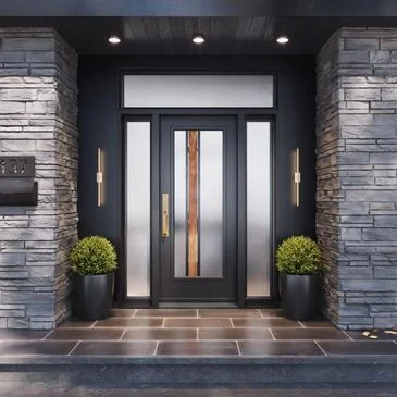 Dark entrance with vertical glazing and a wood-toned decorative strip.